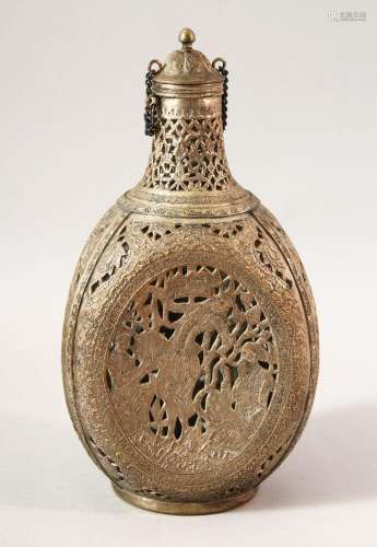 A PERSIAN OPENWORK LIDDED DECANTER, with carved panels of fi...