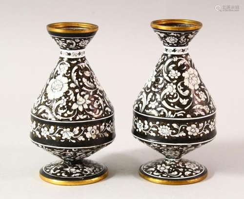 A PAIR OF ISLAMIC BLACK GROUND ENAMEL VASES, each decorated ...
