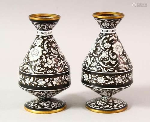 A PAIR OF ISLAMIC BLACK GROUND ENAMEL VASES, each decorated ...