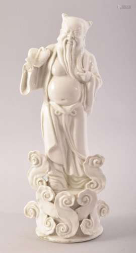 AN EARLY 20TH CENTURY BLANC DE CHINE FIGURE OF A SAGE, 25.5c...