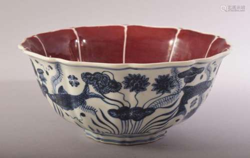 A CHINESE MING STYLE COPPER RED, BLUE & WHITE PORCELAIN ...