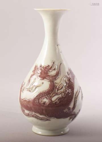 A CHINESE RED AND WHITE PORCELAIN DRAGON VASE, 25.5cm high.