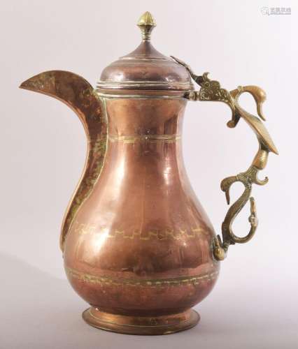 A LARGE INDIAN COPPER BRASS COFFEE POT, with zoomorphic hand...