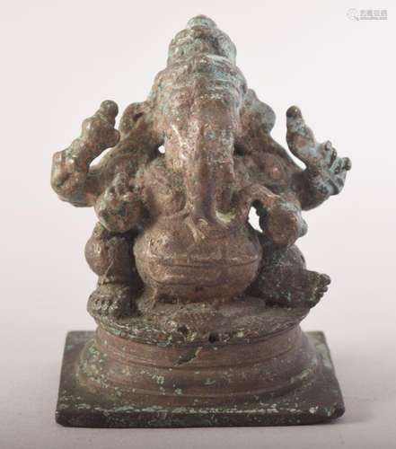 AN EARLY INDIAN BRONZE FIGURE OF GANESHA, 8cm high.