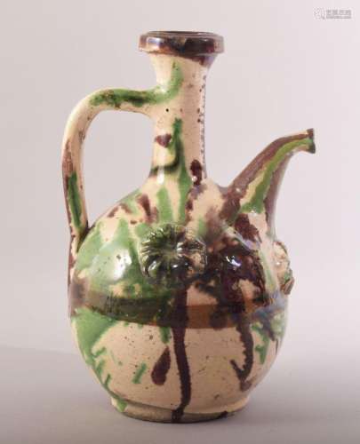 A 19TH CENTURY TURKISH CANAKKALE POTTERY EWER, 26.5cm high.