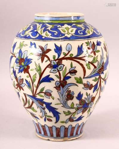 A PERSIAN QAJAR GLAZED POTTERY VASE, with stylised foliate d...