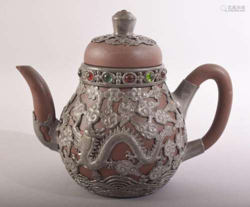 A CHINESE YIXING TEAPOT, with metal mounts and inlaid rim, i...