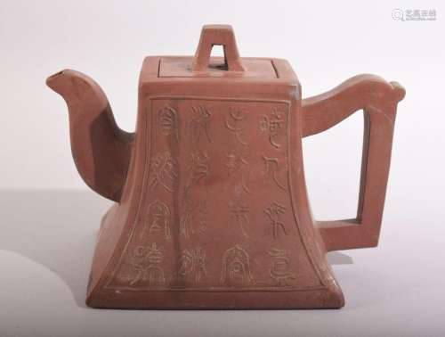 A CHINESE YIXING TEAPOT, with script to one side and mark to...