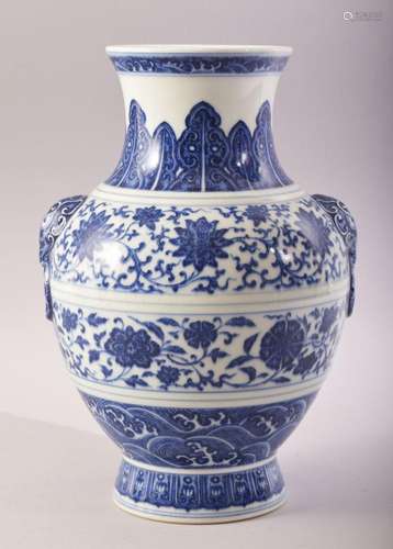 A GOOD CHINESE BLUE AND WHITE PORCELAIN VASE, with two shape...