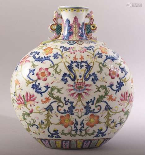 A CHINESE FAMILLE ROSE PORCELAIN TWIN HANDLE MOON FLASK, pai...