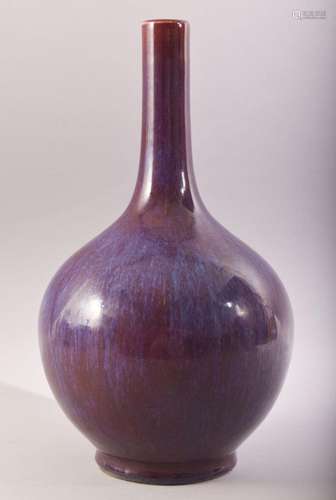 A LARGE CHINESE FLAMBE GLAZE BOTTLE VASE, 37cm high.