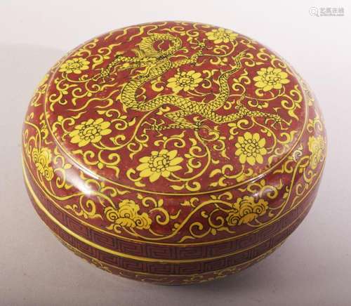 A CHINESE RED GROUND PORCELAIN CIRCULAR BOX AND COVER, paint...