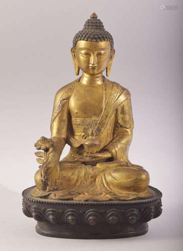 A GOOD LARGE GILT BRONZE SEATED THAI BUDDHA, 30cm high.