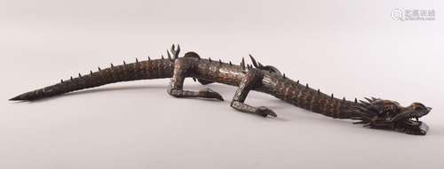 A SUPERB JAPANESE BOXWOOD RETICULATED MODEL OF A DRAGON, sta...