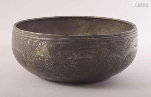 AN ISLAMIC MAMLUK ENGRAVED BRONZE BOWL, engraved with panels...