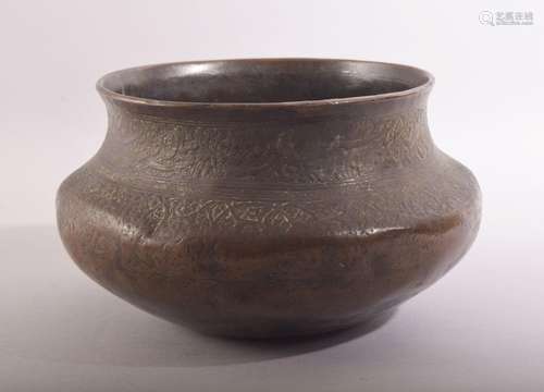 A GOOD ISLAMIC MAMLUK ENGRAVED AND CHASED BRONZE BOWL, the r...