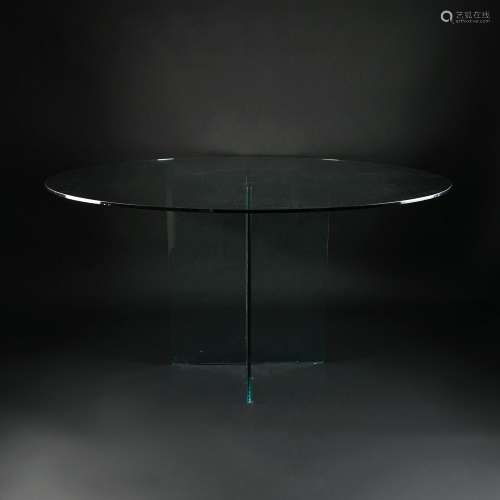 A glass round top table