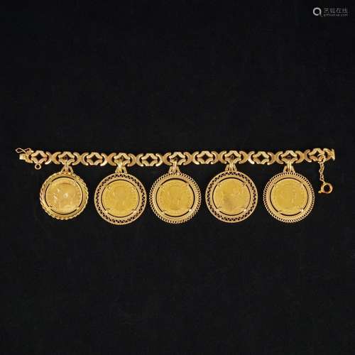 A 18kt. gold bracelet with 5 English pounds