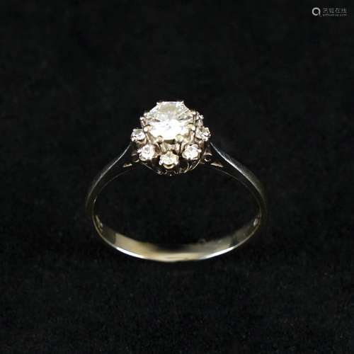 A 18kt. gold ring with diamond