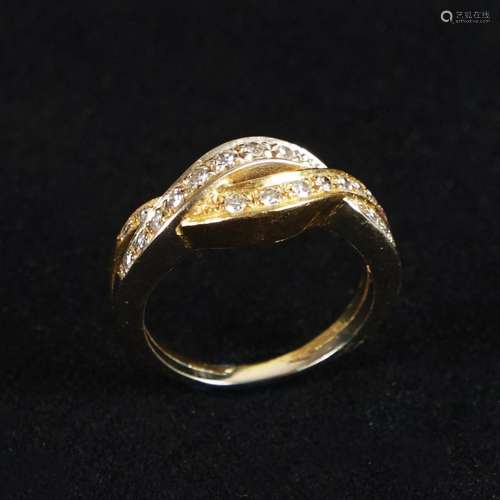 A 18kt. gold ring with diamonds