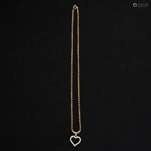 A 18kt. gold collier with a heart pendant with diamonds