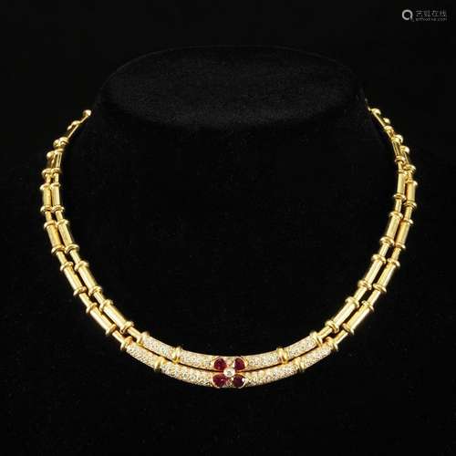 A 18kt. gold collier with rubies and diamonds