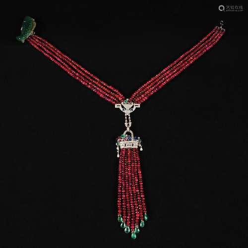 A 18kt gold, sapphires, emeralds, rubies and diamonds nackla...