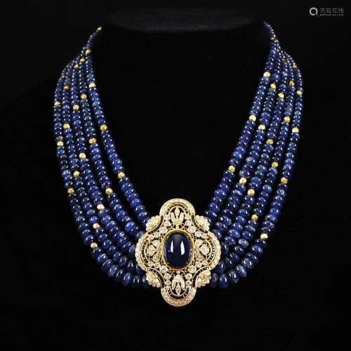 a 18kt. gold with sapphires and diamonds