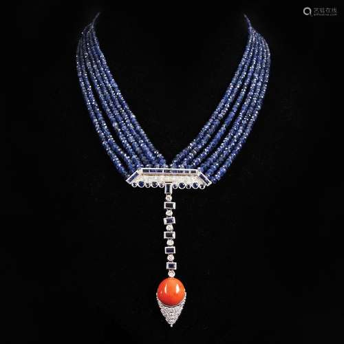 A 18kt. gold necklace with kyanite, sapphires, diamonds and ...