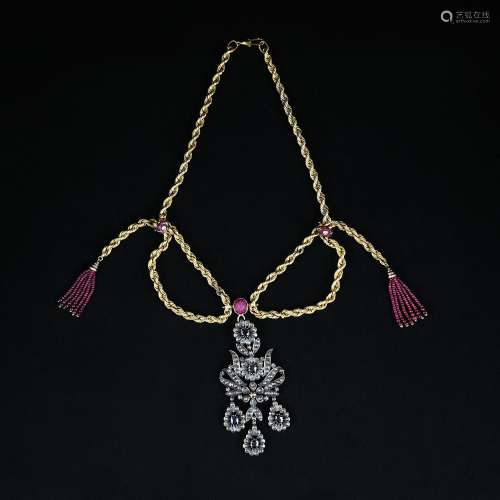 A flake pendant with diamonds, sapphires and rubies
