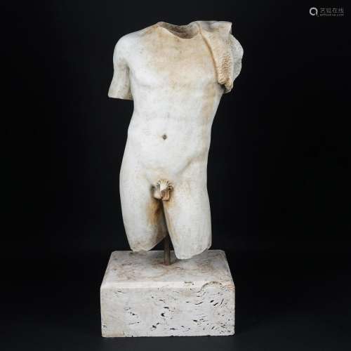 A white marble male torso