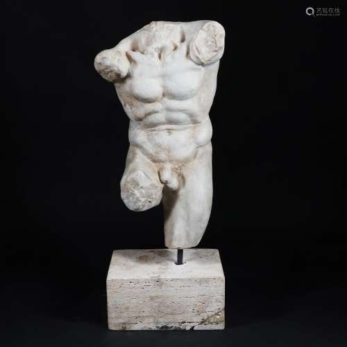 A white marble male torso