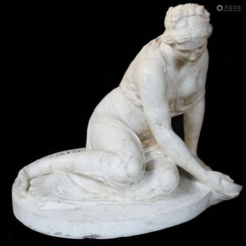 A white marble figure of a sitting naiad