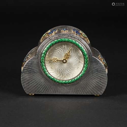 An English sterling silver table clock decorated with enamel...