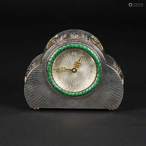 An English sterling silver table clock decorated with enamel...