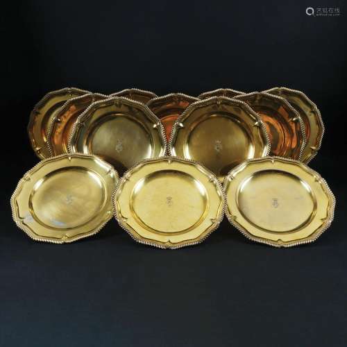 12 Roman 800/1.000 silver gilt plates