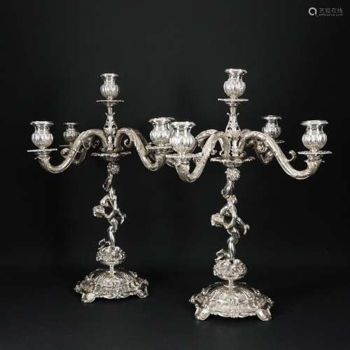 A pair of Italian 800/1.000 silver five-light candelabra