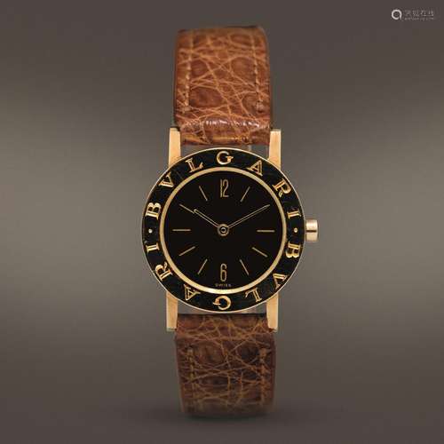 BULGARI - Lady con cassa a moneta in oro 18k al quarzo, quad...