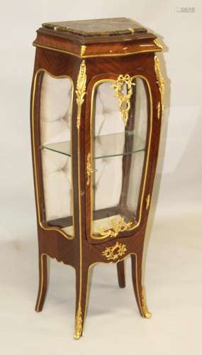 A LOUIS XVI STYLE VITRINE with marble top, glass door and si...