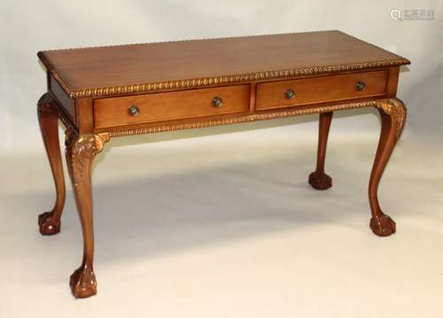 A GOOD CHIPPENDALE DESIGN MAHOGANY LONG SERVING TABLE with c...