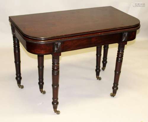 AN EARLY 19TH CENTURY MAHOGANY EXTENDING DINING TABLE, with ...