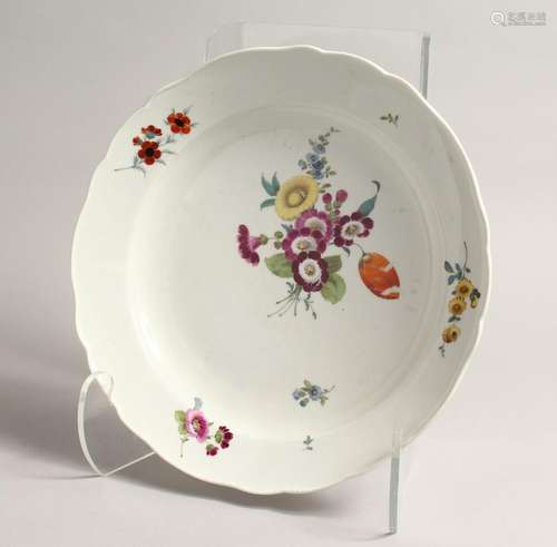 A GOOD 20TH CENTURY MEISSEN CIRCULAR DISH with shaped border...