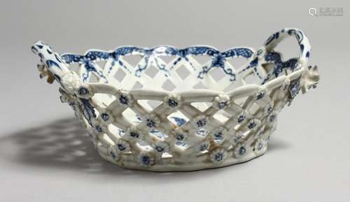 AN 18TH CENTURY PIERCED WORK BASKET with two handles, decora...