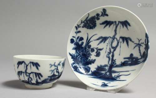 AN 18TH CENTURY WORCESTER TEA BOWL AND SAUCER painted with a...