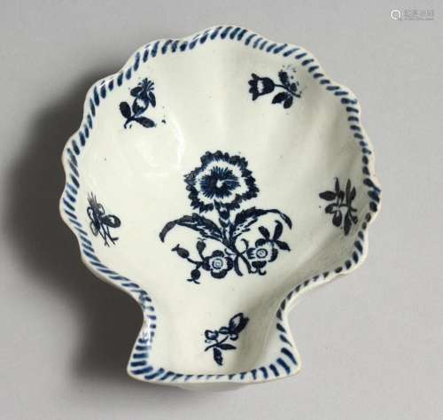 AN 18TH CENTURY LIVERPOOL SHELL SHAPED DISH, on three conica...