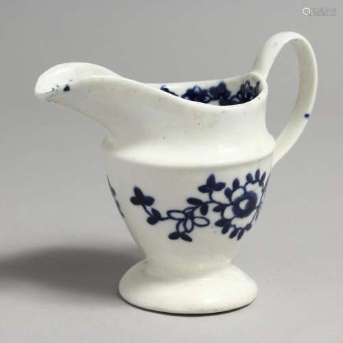 AN 18TH CENTURY LIVERPOOL PEDESTAL CREAM JUG painted with fl...