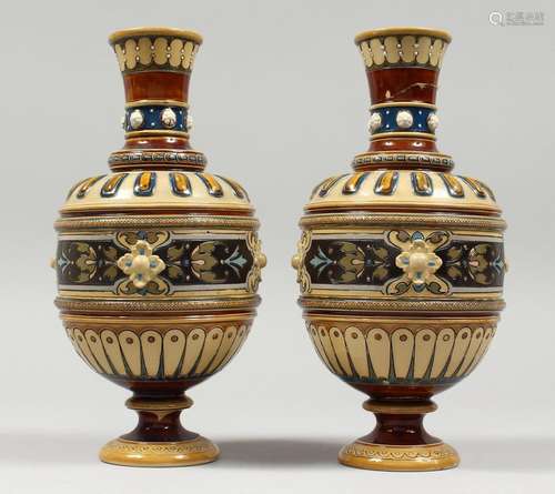 A PAIR OF METTLACH POTTERY VASES, one AF. 9ins