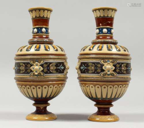A PAIR OF METTLACH POTTERY VASES, one AF. 9ins