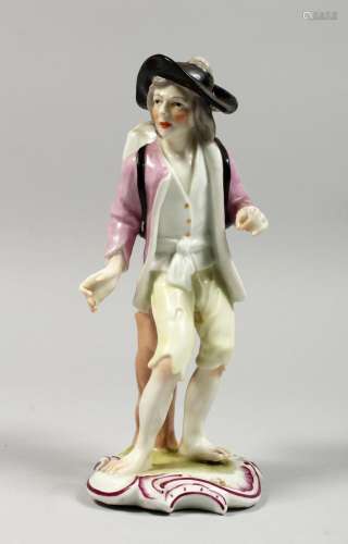 A CONTINENTAL PORCELAIN FIGURE OF A MAN, a hog on his back. ...