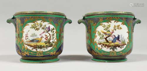 A GOOD SMALL PAIR OF SEVRES JARDINIERES, painted with panels...